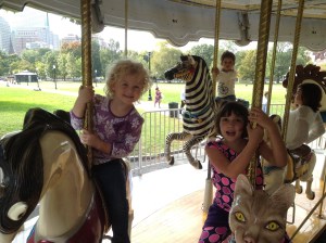 2 epilepsy warriors sharing a carousel ride after participating in a protest for cannabis access. 